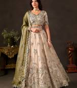 Artistic Cream Embroidered Silk Marriage Wear Lehenga Choli
