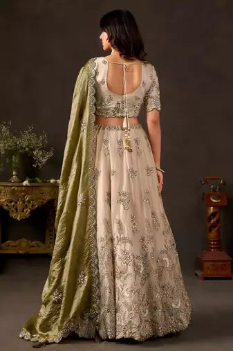 Artistic Cream Embroidered Silk Marriage Wear Lehenga Choli
