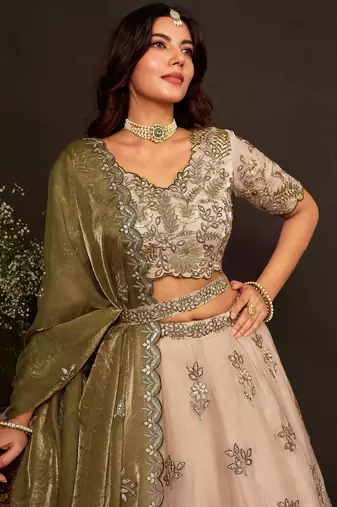 Artistic Cream Embroidered Silk Marriage Wear Lehenga Choli