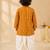 Boy's mustard rayon bandhni thigh length kurta and dhoti set
