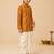 Boy's mustard rayon bandhni thigh length kurta and dhoti set