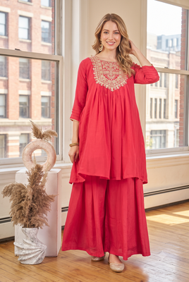 Coral red embroidered yoke pleated short kurti with flared palazzo set for women 1