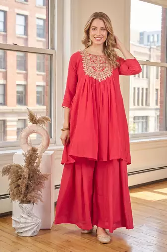 Coral red embroidered yoke pleated short kurti with flared palazzo set for women