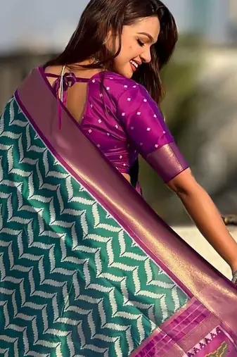Teal woven design zari banarasi saree with blouse piece