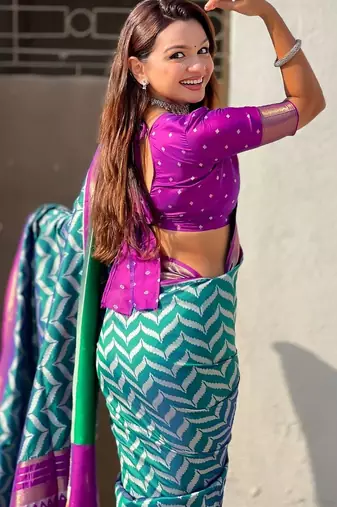 Teal woven design zari banarasi saree with blouse piece