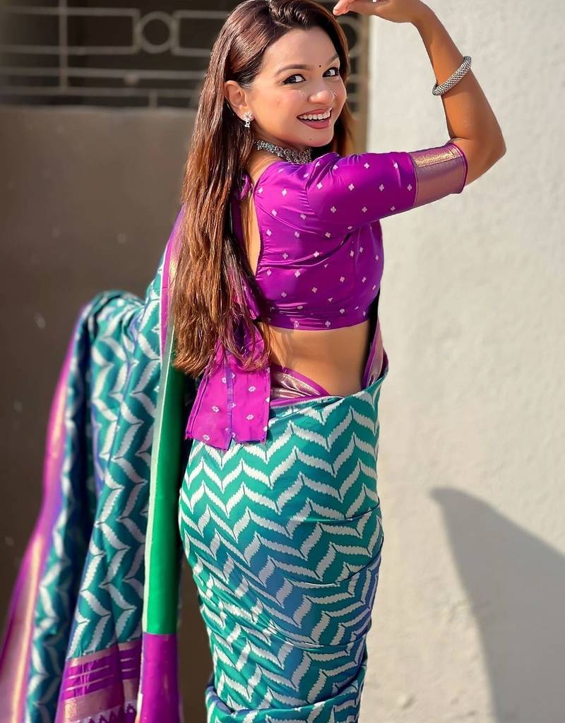 Teal woven design zari banarasi saree with blouse piece