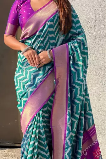 Teal woven design zari banarasi saree with blouse piece