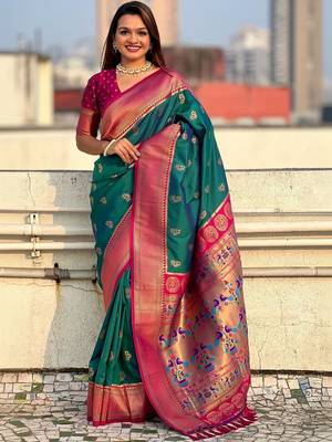 Green woven design zari silk blend paithani saree 1