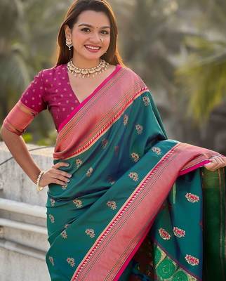 Green woven design zari silk blend paithani saree 4