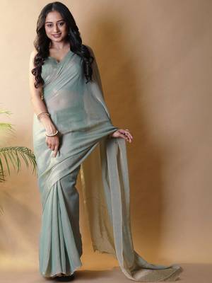 Sea green georgette silk saree with blouse piece 1