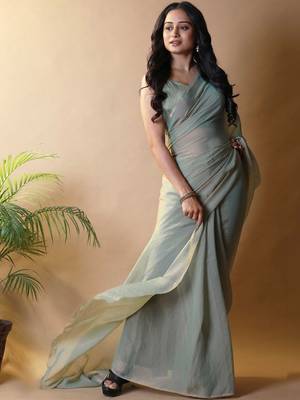 Sea green georgette silk saree with blouse piece 2