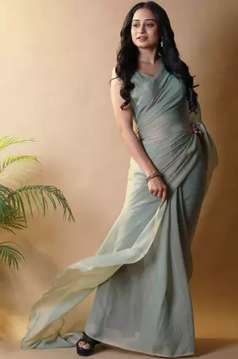 Sea green georgette silk saree with blouse piece