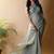 Sea green georgette silk saree with blouse piece