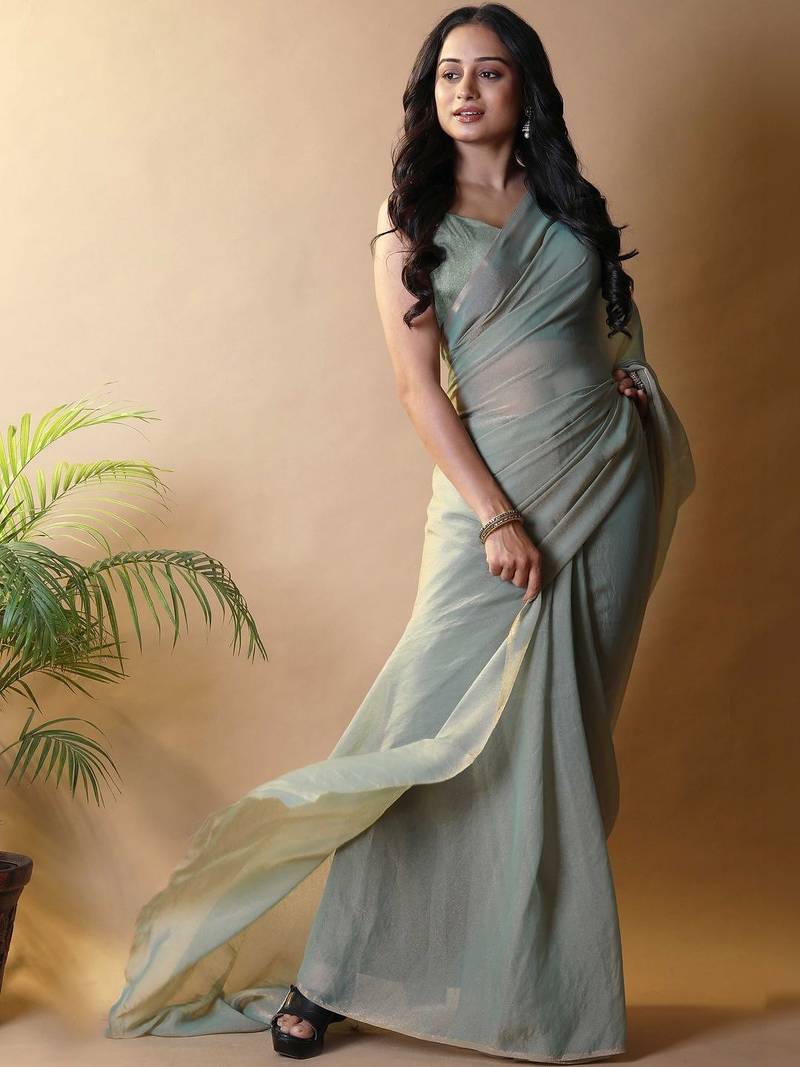 Sea green georgette silk saree with blouse piece