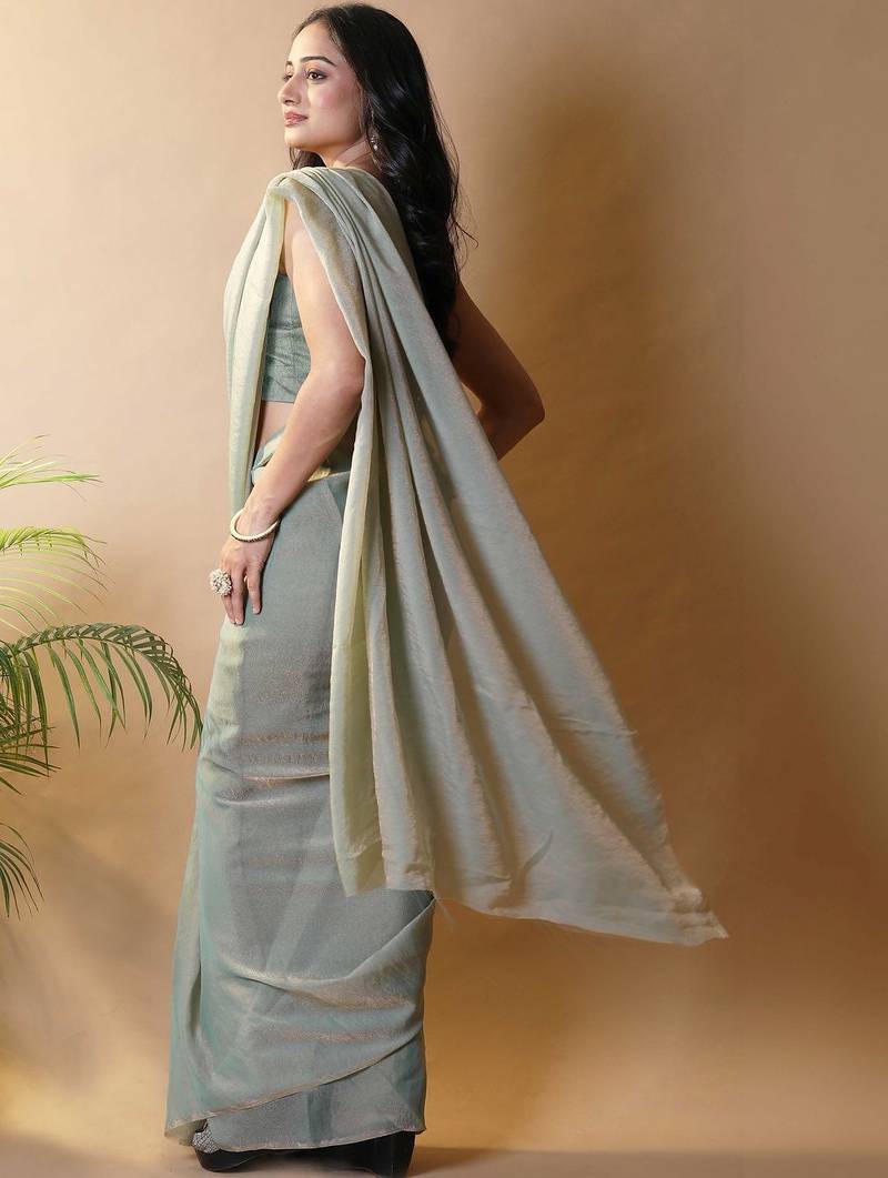 Sea green georgette silk saree with blouse piece