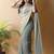 Sea green georgette silk saree with blouse piece