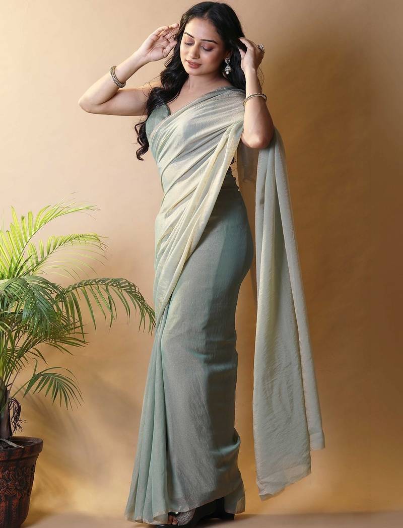 Sea green georgette silk saree with blouse piece