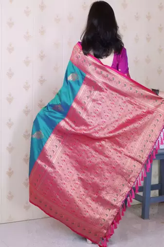 Teal ethnic motifs zari silk blend banarasi saree