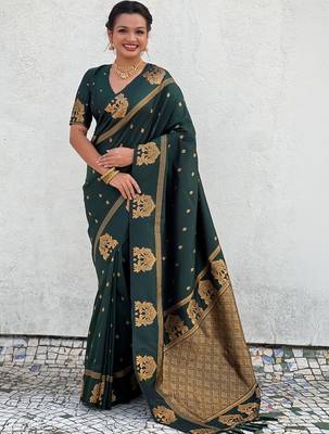 Green woven design zari silk blend designer banarasi saree 1