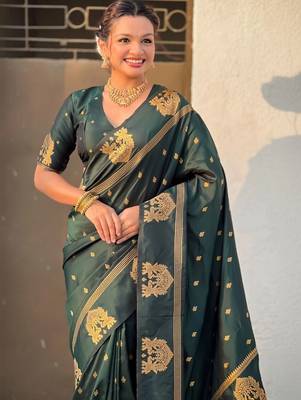 Green woven design zari silk blend designer banarasi saree 2