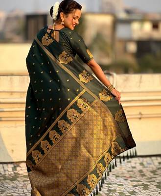 Green woven design zari silk blend designer banarasi saree 3