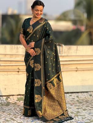 Green woven design zari silk blend designer banarasi saree 4