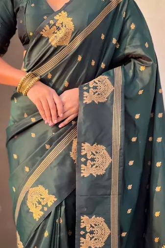 Green woven design zari silk blend designer banarasi saree