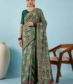 Green ethnic motifs embroidered silk blend banarasi saree