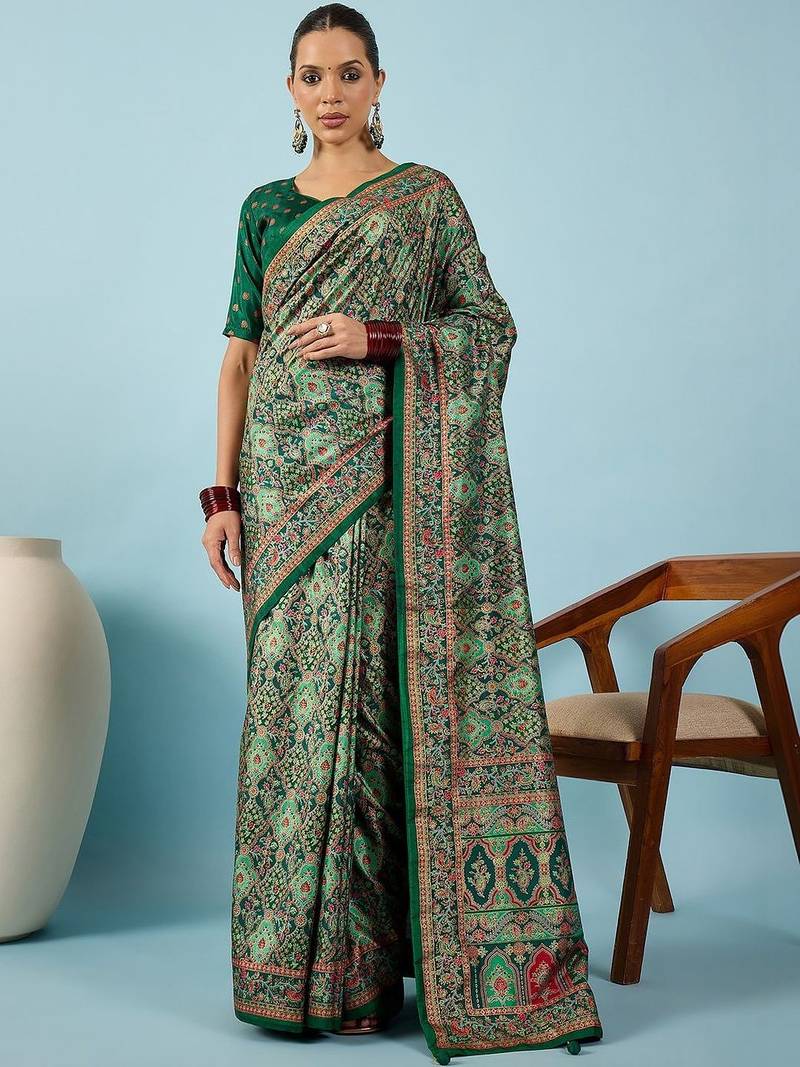 Green ethnic motifs embroidered silk blend banarasi saree