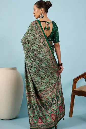 Green ethnic motifs embroidered silk blend banarasi saree