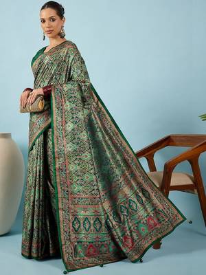 Green ethnic motifs embroidered silk blend banarasi saree 4