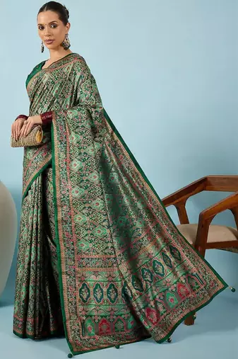 Green ethnic motifs embroidered silk blend banarasi saree
