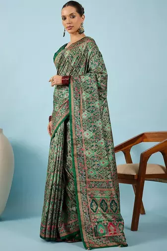 Green ethnic motifs embroidered silk blend banarasi saree