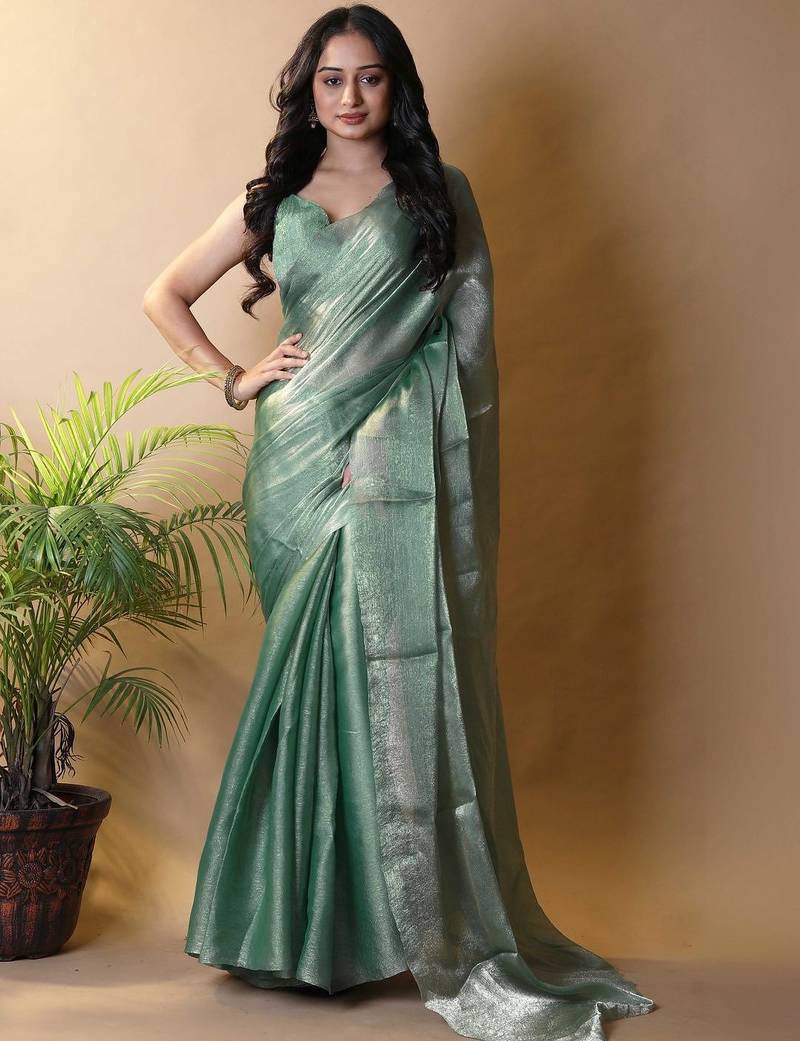 Sea green saree with blouse piece