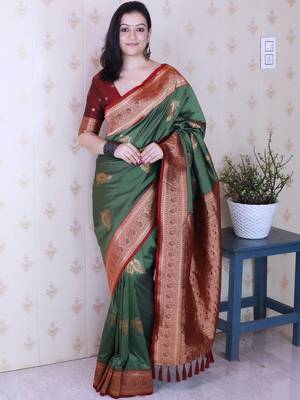 Green ethnic motifs zari silk blend banarasi saree 1