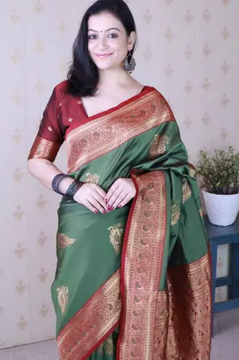 Green ethnic motifs zari silk blend banarasi saree