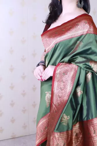 Green ethnic motifs zari silk blend banarasi saree
