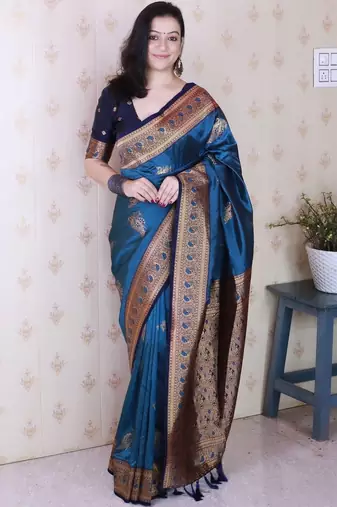 Teal ethnic motifs zari silk blend banarasi saree