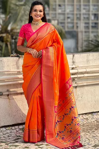 Orange woven design zari silk blend heavy work paithani saree