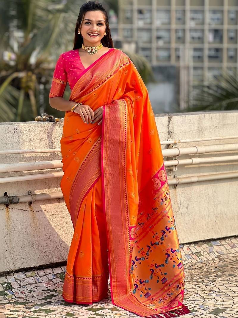 Orange woven design zari silk blend heavy work paithani saree