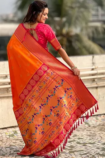Orange woven design zari silk blend heavy work paithani saree