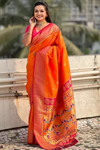 Orange woven design zari silk blend heavy work paithani saree