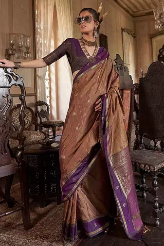 Beige ethnic motifs woven design zari tussar saree