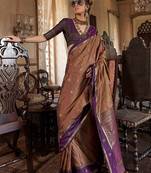 Beige ethnic motifs woven design zari tussar saree