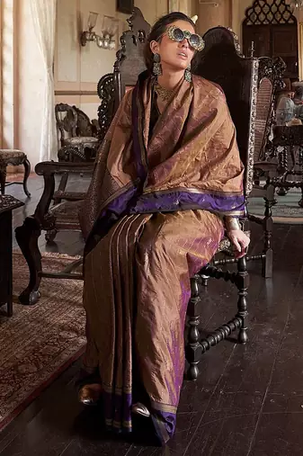 Beige ethnic motifs woven design zari tussar saree
