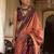 Orange striped woven design zari tussar saree
