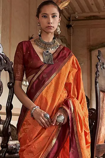 Orange striped zari tussar saree