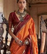 Orange striped zari tussar saree