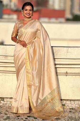 Cream woven design tissue tussar saree