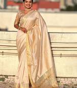 Cream woven design tissue tussar saree